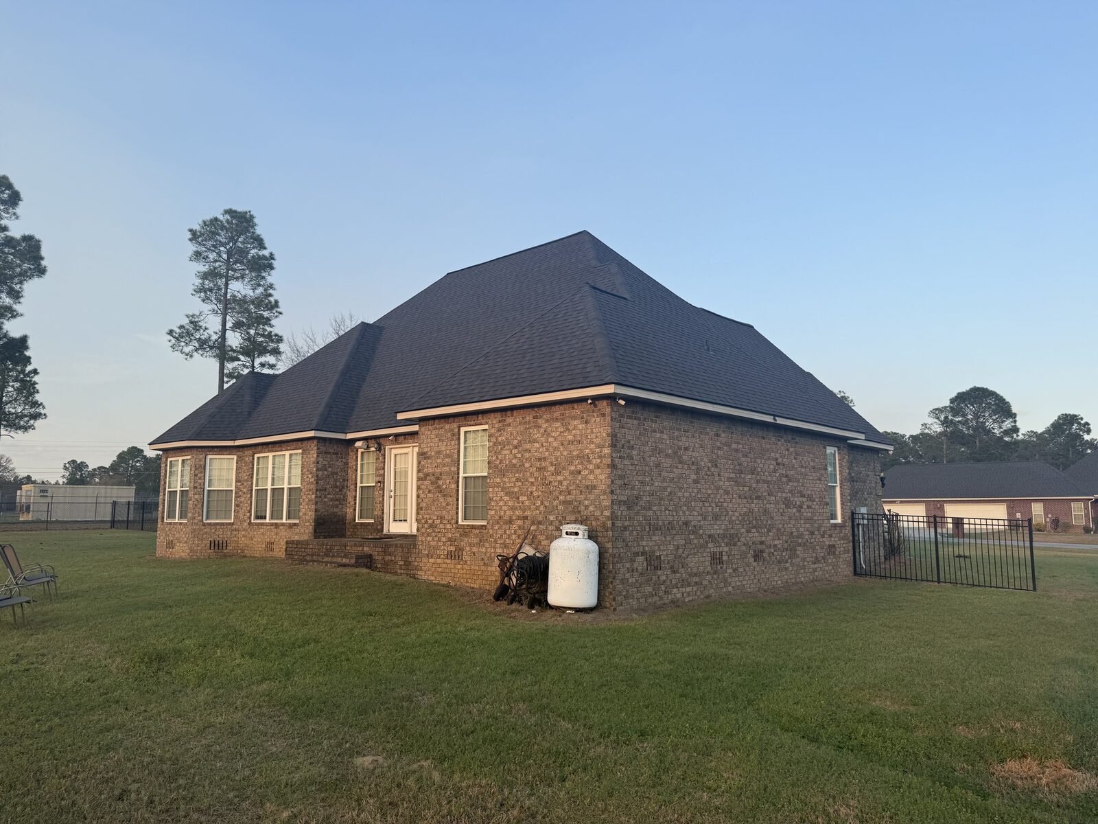 Finished architectural shingle roof on a brick home in Middle Georgia