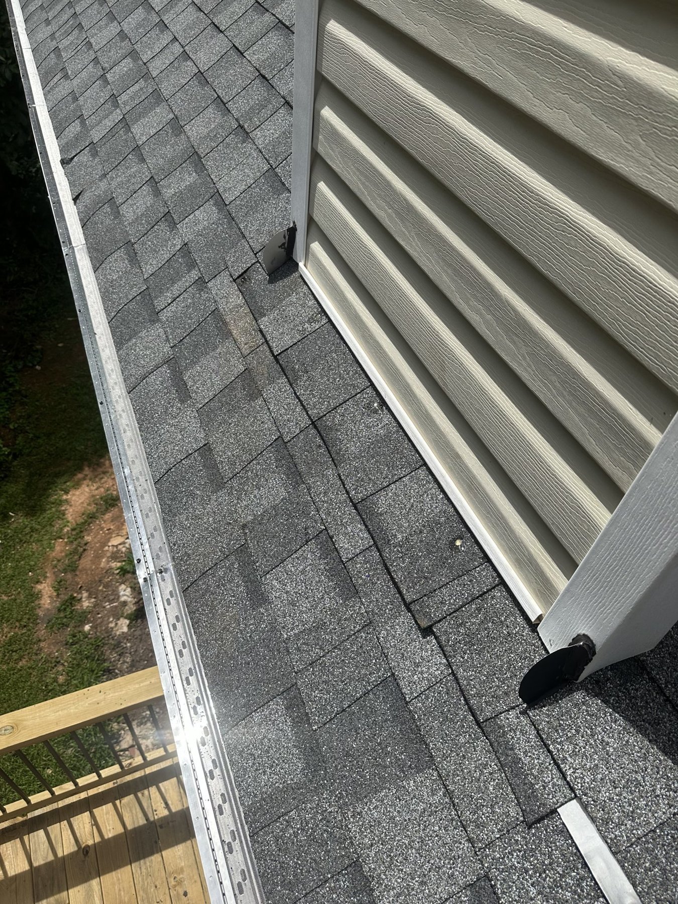 New gutter guards installed on an architectural shingle roof in Middle Georgia