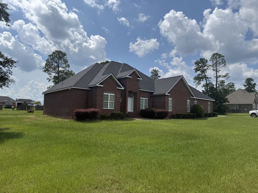 Brick home in Monroe County, GA with a finished roof