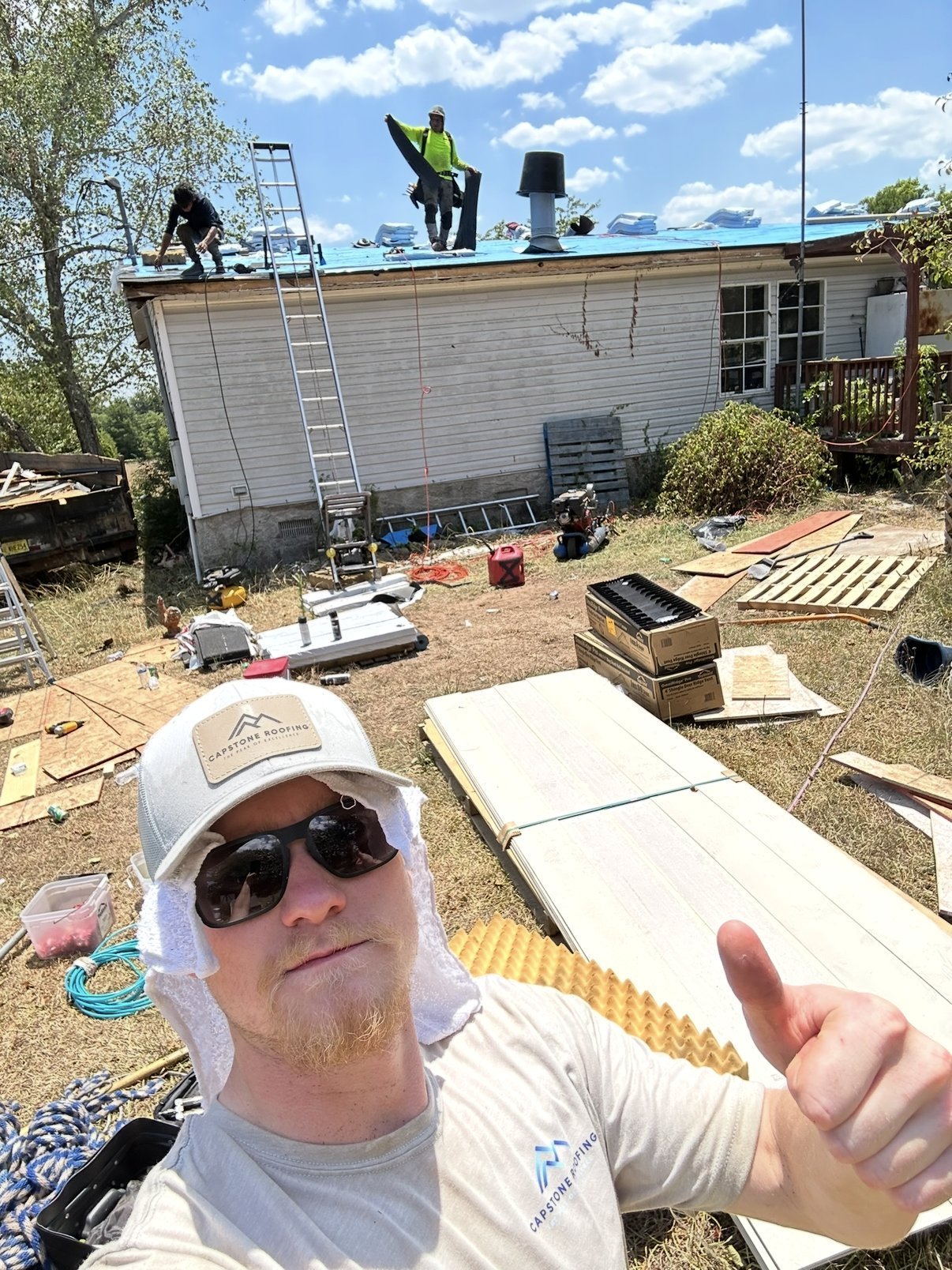 Zach Metzler and the Capstone crew on a roof replacement job in Middle Georgia